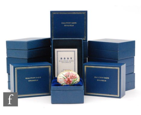 A collection of Halycon Days 'A Year to Remember' enamel patch boxes, years 1990 and 1994-2005, all with blue boxes. (13)