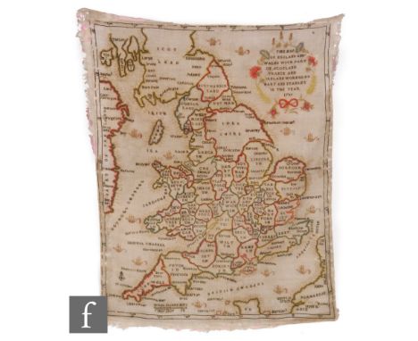 An 18th Century needlework sampler on a linen panel depicting a map of the British Isles, titled within a floral cartouche 'T