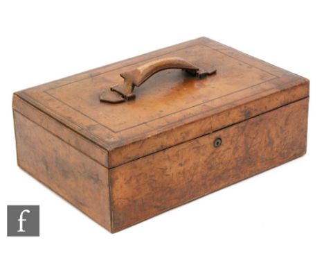 A Victorian stitched leather writing box mounted with a handle, the interior fitted with an ink and light container with a sl