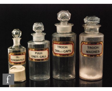 A set of four late 18th to early 19th Century York Glass Co pharmaceutical jars, all of clear cylindrical form with collar ne