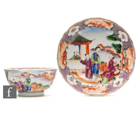 A Chinese Qianlong (1736-1795) period export porcelain teabowl and saucer, the 'U' form footed bowl and scalloped rim saucer 