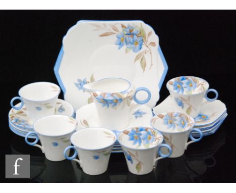 A collection of Shelley 'Syringa' tea wares to include six teacups, milk jug, six saucers, twelve tea plates, two cake plates