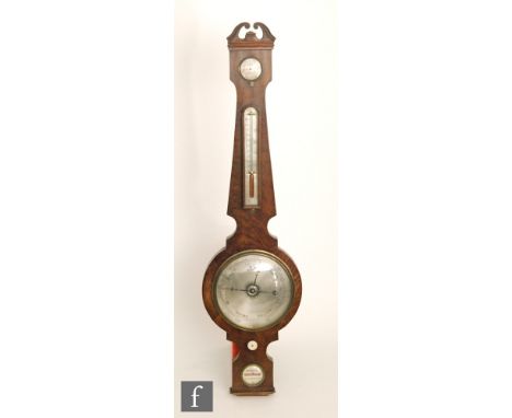 A 19th Century mahogany wheel barometer by Mark &amp; Co Peterborough, incorporating Dry/Damp dial above a thermometer and si
