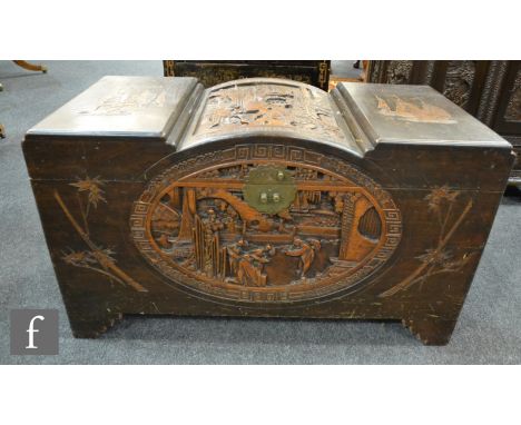 A 20th Century Oriental Export camphor wood coffer chest, carved with sailing ships and also with figures within garden setti