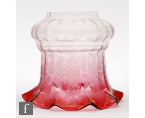 A Victorian graduated ruby light shade with frill rim, etched with floral decoration, height 17.5cm.