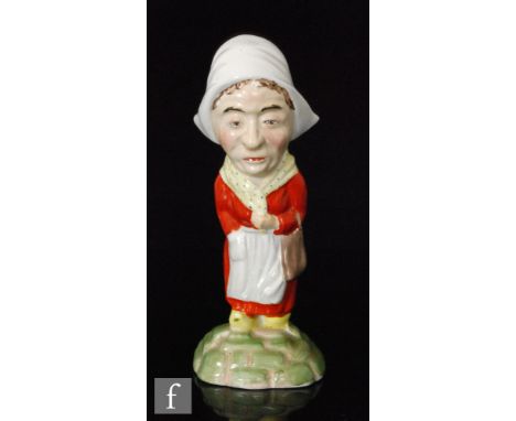 A.J Wilkinson ceramic figure of a Dutch lady, designed by Clarice Cliff, modelled wearing mop cap and clogs, green shield mar