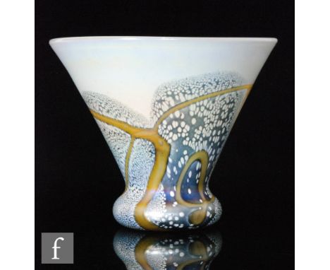 A contemporary Heron Glass vase of footed conical form decorated with cinnamon whiplash trails over mottled grey on an irides