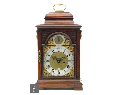 An early 19th Century mahogany and glazed cased table or bracket clock, the six pillar twin train fusee movement striking on 