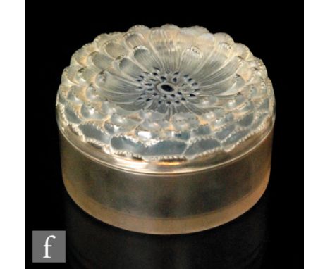 A 1930s Rene Lalique Dahlia pattern powder box and cover of circular form, the lid relief moulded in the form of a flower wit