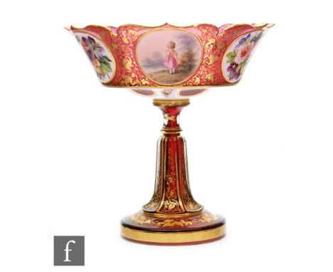 A late 19th Century Bohemian ruby glass pedestal bowl with scalloped rim decorated with panels of enamelled decoration of chi