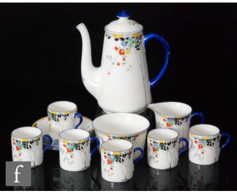 An early 20th Century Shelley coffee service in pattern no. 11602 'Leafy Branches', comprising six coffee cans and saucers in