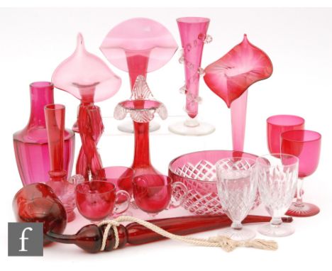 A collection of 19th Century ruby glass items, mostly Stourbridge, comprising various vases including Jack in the Pulpit exam