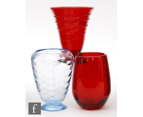 A collection of Whitefriars glass vases comprising a pattern 9358 footed vase with an optic wave pattern in sapphire, height 