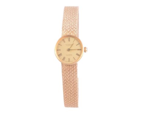 Tissot - a lady's 9 carat yellow gold quartz bracelet wristwatch, 16mm circular champagne dial with Arabic numerals in an 18m