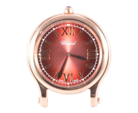 Chopard - a Happy Sport Table Strut Clock with travel case, 6cm rose pink Roman numeral dial in a 7.4cm rose gold tone plated