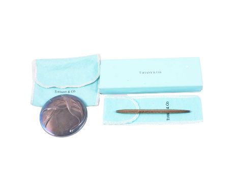 Tiffany - a silver-plated handbag mirror, and silver pen, Tiffany - a silver-plated handbag mirror, leaf design, 7.5cm diamet