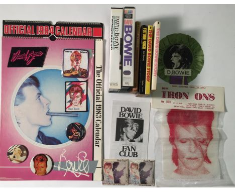 DAVID BOWIE MEMORABILIA. A collection of assorted Bowie memorabilia to include: 'Coffer London' sealed Aladdin Sane iron on p