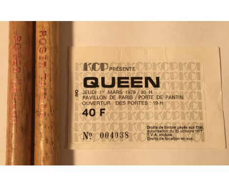 ROGER TAYLOR USED DRUMSTICKS. A pair of Roger Taylor embossed drumstick, used for the Paris 1979 concerts - 27th February - 1