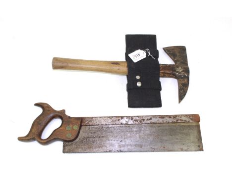 A 1917 dated and maker marked saw with an axe