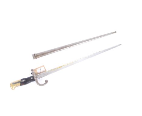 A French model 1874 Epée bayonet for the Gras rifle complete with matching numbered scabbard, blade marked and dated 1879