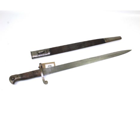 A British model 1887 M3 sword bayonet with scabbard, this example by Wilkinson London issue date (under crown and VR) 89