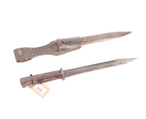 A Third Reich era K98 bayonet, blade marked 44/FNJ matching numbers with scabbard and leather frog included