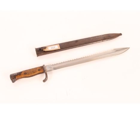 A German model 1898-05 Sawback bayonet and scabbard, both by Mauser, excellent blade marked 1917
