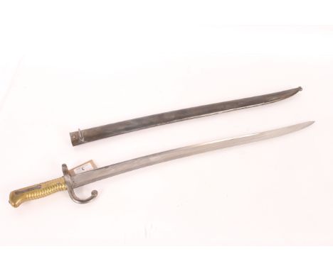 A French model 1866 sabre bayonet with brass hilt and matching numbered scabbard. A very good example