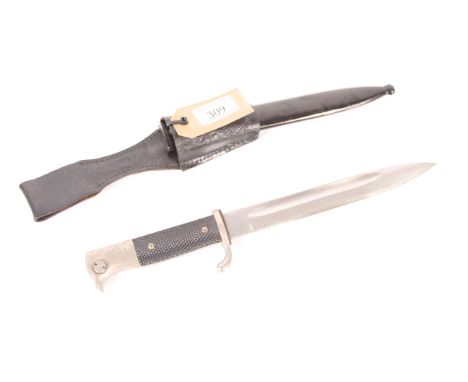 A German parade bayonet by Gustav Spitzer Solingen with black painted scabbard and leather frog