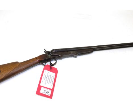 A double barrel .410 shotgun. This example being a hammer side lever model with N.V.S.N. or maker, marked "Foreign"
This item