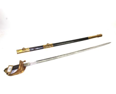 A British Naval Warrant Officers sword with scabbard 