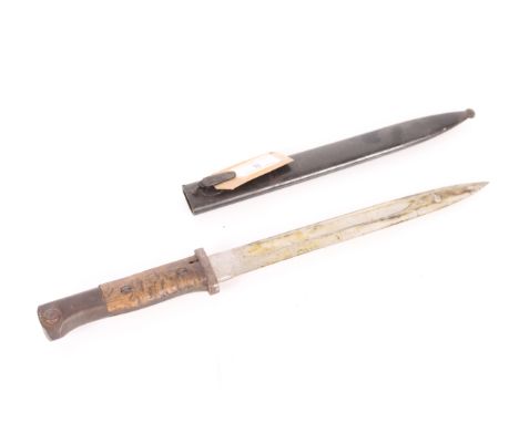A German WWI era model 1914 bayonet with scabbard. This example by Gerberheller Marienthal