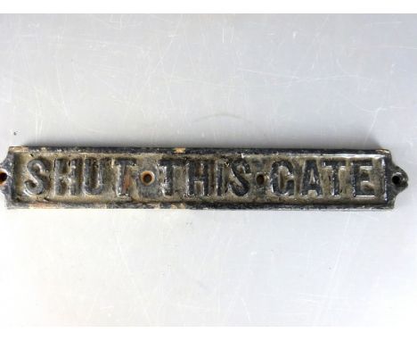 Rectangular cast iron 'Shut This Gate' sign, L44cm   Condition Report   Click here for further images, condition, auction tim