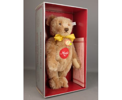 Steiff replica 1951 bear 'Musikteddy Caramel 31, limited edition No.05292/7000, with certificate, H32cm, boxed   Condition Re