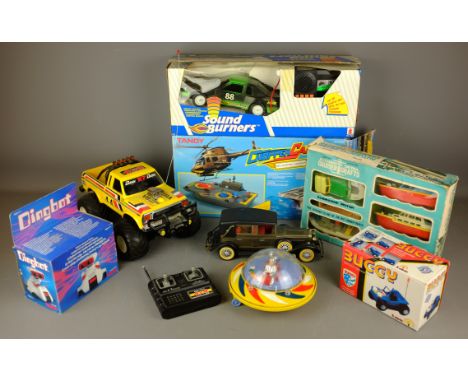 Collection of Battery Operated toys including: 1960's Cruiser Crafts, Tandy Chopper Carrier, Dingbot, Buggy, Sound Burners ca