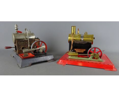 Mamod Minor Stationary Steam Engine, with brass boiler & a German Stationary Steam Boiler with chrome boiler on brick effect 