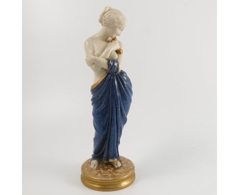 A Royal Worcester figure, Bather Surprised, the parian figure with powder blue robe, to a gilt base, dated 1930, height 10ins
