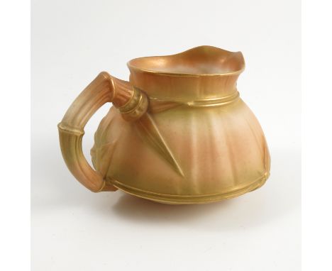 A Royal Worcester gilded ivory jug, with moulded bamboo decoration to the body, shape number 1196, dated 1904, height 3ins Co