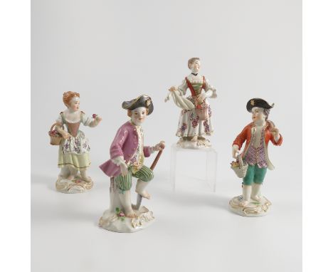 Two pairs of 20th century Meissen porcelain figures, of couples holding baskets of flowers and the men tools, on scroll bases
