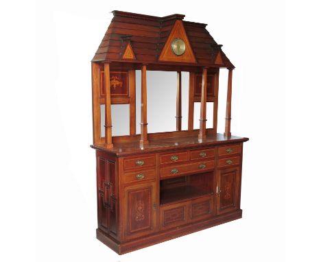 A late 19th Century mahogany sideboard, with an architectural roof canopy with three dormers, the larger central dormer fitte