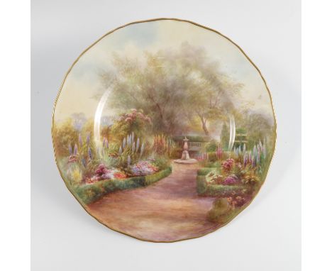 A Royal Worcester cabinet plate, decorated with a garden scene by Rushton, diameter 11ins Condition report: Appears good cond