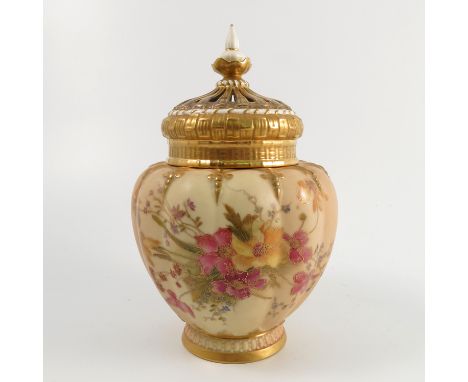 A Royal Worcester blush ivory pot pourri, the associated cover with basket moulding and gilded, the reeded body decorated wit