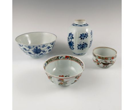 A Chinese tea caddy, together with a bowl, having six character marks within a circle to the base, damaged, and another Kangz