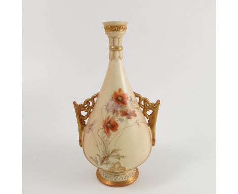 A Royal Worcester blush ivory vase, with pierced gilt handles, decorated with flowers by Edward Raby, shape number 982, dated