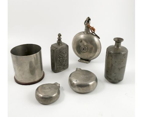 Two similar pewter flasks, of circular form, diameters 4ins and 3.25ins, together with a pewter flask of circular form with s
