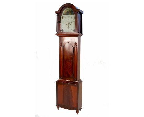 A 19th century mahogany long case clock, with arched enamelled dial, height 86ins