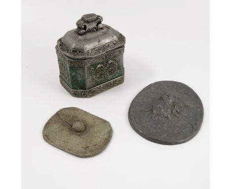 An Antique lead tobacco box, of rectangular form with canted corners, having embossed decoration, with inner weight, 4.25ins 