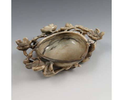 A Ming/Qing jade peach cup, carved with foliage, af, maximum diameter 5.5ins Condition report: Damage and loss to flowers