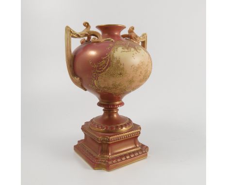 A Royal Worcester pedestal vase, decorated in shot enamels, the shimmer pink ground decorated with a blush ivory ground reser