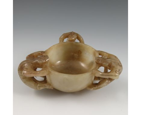 A Ming/Qing jade cup, mounted with three dragons, maximum width 5ins   Condition report:  Substantial natural flaw to stone